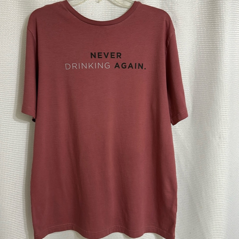Travis Mathew’s  tee shirt. Size L